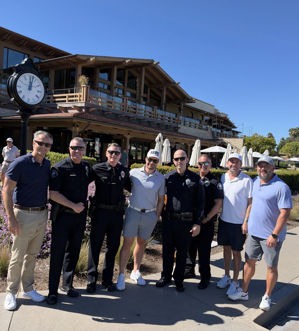 NBPD officers and golfers at the 2026 NBPF Golf Classic