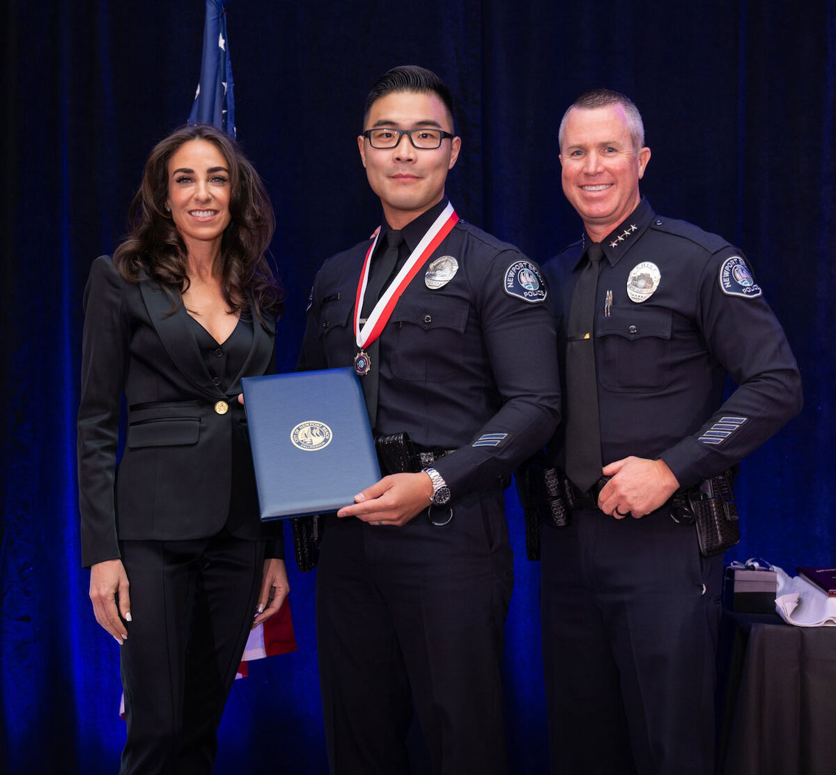 Officer Jay Kim receiving the 2025 Award of Merit